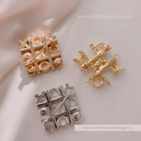 SWAROVSKI Брошь «Крестики-нолики: серебро»