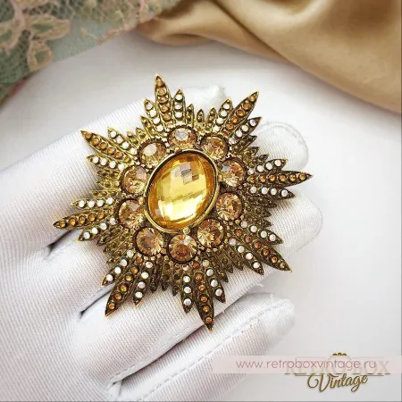 JOAN RIVERS Брошь «Орден солнца»