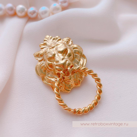 ANNE KLEIN Брошь «Лев с кольцом»