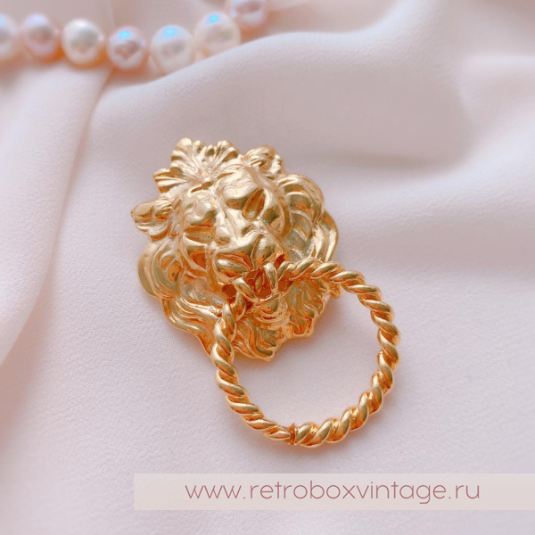 ANNE KLEIN Брошь «Лев с кольцом»