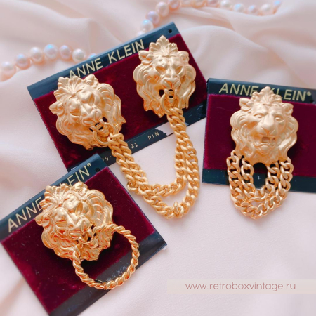 ANNE KLEIN Брошь «Лев с кольцом»