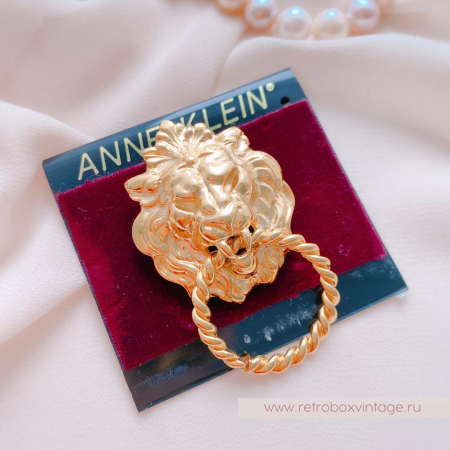 ANNE KLEIN Брошь «Лев с кольцом»