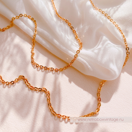 AVON Ожерелье-лорнет с лупой "Два ангелочка" 1997 г.