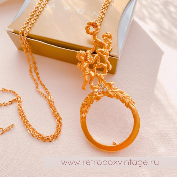 AVON Ожерелье-лорнет с лупой "Два ангелочка" 1997 г.