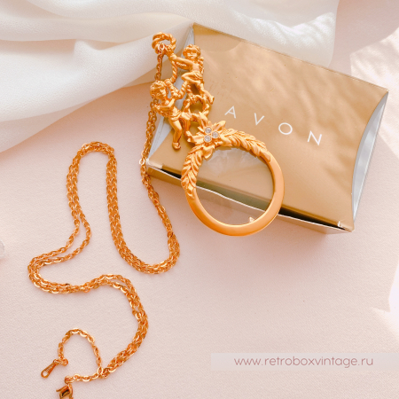 AVON Ожерелье-лорнет с лупой "Два ангелочка" 1997 г.