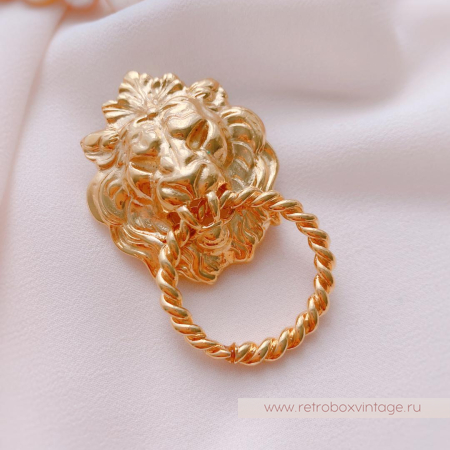 ANNE KLEIN Брошь «Лев с кольцом»