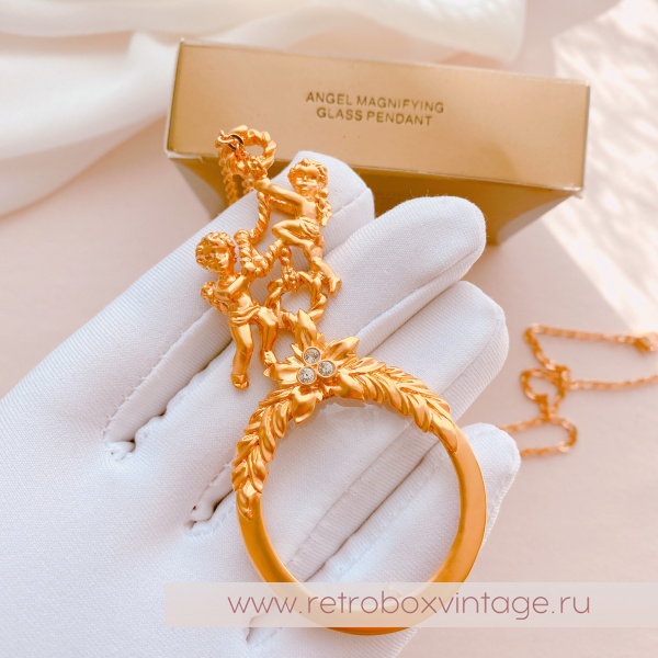 AVON Ожерелье-лорнет с лупой "Два ангелочка" 1997 г.