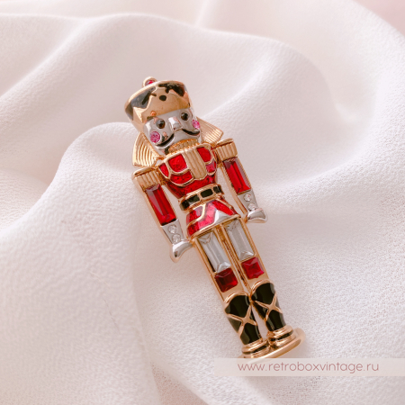 MONET Брошь «Красный щелкунчик»