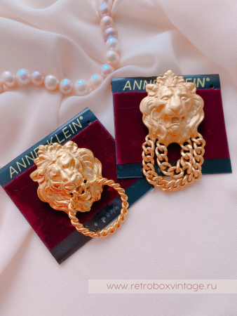ANNE KLEIN Брошь «Лев с кольцом»