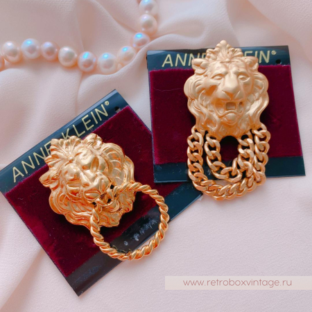 ANNE KLEIN Брошь «Лев с кольцом»