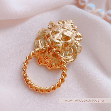 ANNE KLEIN Брошь «Лев с кольцом»